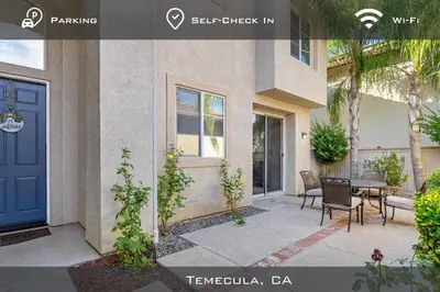 a front door of a house with a table and chairs at Spacious Extended Stay Temecula in Temecula