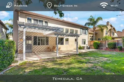 a picture of a house with a garage at Spacious Extended Stay Temecula in Temecula