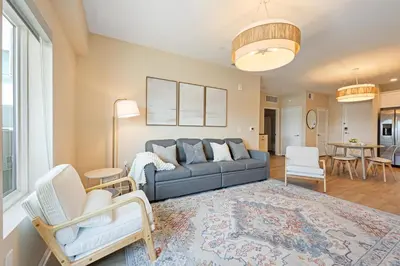 a living room with a couch and two chairs at NEW LUX Modern Retreat Views Parking Workspaces in San Diego