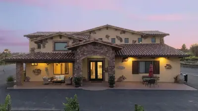 a house with a patio in front of it at New-Build Temecula Villa with King Suite Patio Vineyard Views The Villa by AvantStay in Temecula
