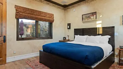 a bedroom with a large bed and a window at Soaking Tub Vineyard Views Wine Trail Access The Casita at Vines Estate by AvantStay in Temecula