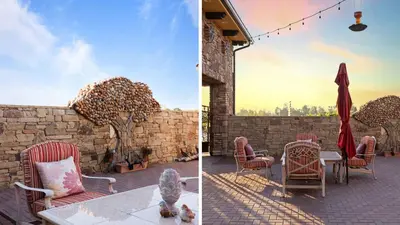 a patio with chairs and a table with an umbrella at Soaking Tub Vineyard Views Wine Trail Access The Casita at Vines Estate by AvantStay in Temecula