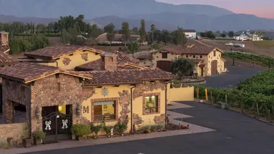 an aerial view of a house with a driveway at Soaking Tub Vineyard Views Wine Trail Access The Casita at Vines Estate by AvantStay in Temecula