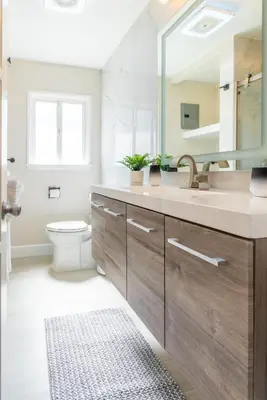 a bathroom with a sink and a mirror at Allure Retreat in San Diego