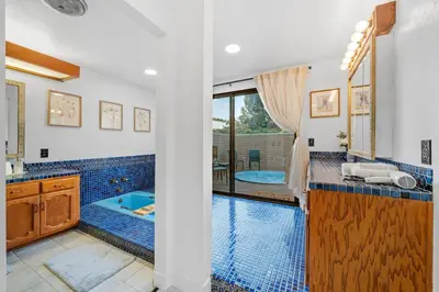 a bathroom with a swimming pool and a tub at Entire Private Home with 3 Bedrooms 2 Bathrooms, Mountain View, Jetted Tub, 2500 sqft, King Bed,Garage, Available Now in Jamul