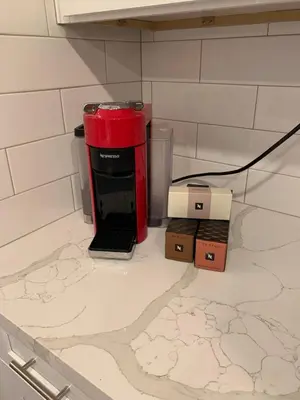 a coffee maker sitting on top of a counter at Beautifully Remodeled 2BR Prime Irvine Location in Irvine