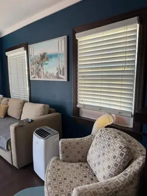 a living room with a couch and a chair at Cozy cottage in San Diego