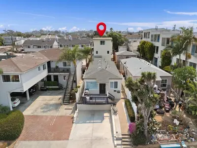 an aerial view of a house with a red marker on it at Renovated Coastal 2BR - Stylish & Bright in San Diego