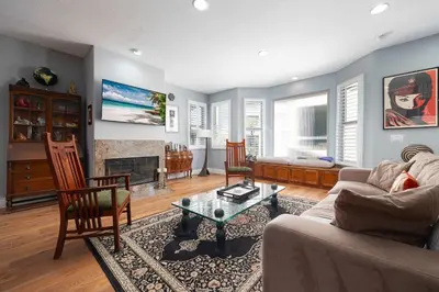 a living room with a couch and a table at Prime Location Spacious townhome in San Diego