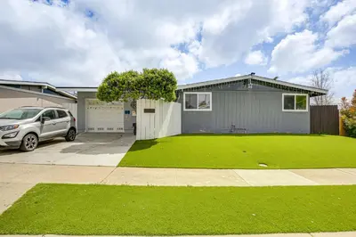 a car parked in front of a house at 6 Mi to Pacific Beach Pet-Friendly San Diego Home in San Diego