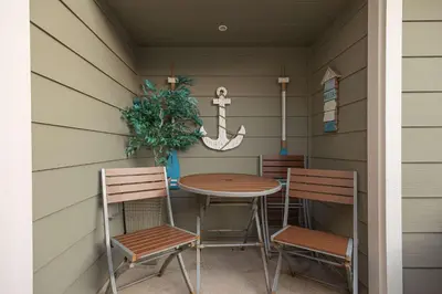 a table and chairs in a corner of a house at Steps from Bay Ocean Villa in San Diego