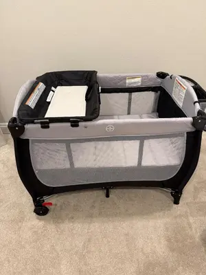 an open suitcase is sitting in a room at OC Heated Pool,Fire Pit,Spa,BBQ,Disney,Beaches in Mission Viejo