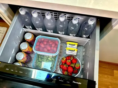 a refrigerator filled with lots of food and drinks at Bay View Bungalow in San Diego