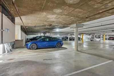 a blue car parked in a parking garage at Solana Beach Gem - AC and Beach Access in Solana Beach