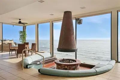 a living room with a view of the ocean at Solana Beach Gem - AC and Beach Access in Solana Beach