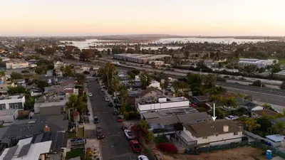 an aerial view of a city with a river and buildings at Ocean Views 2 Kitchen Living area Villa in San Diego