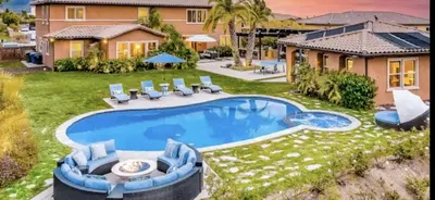 a house with a swimming pool in the yard at Daydream Palace in Chula Vista