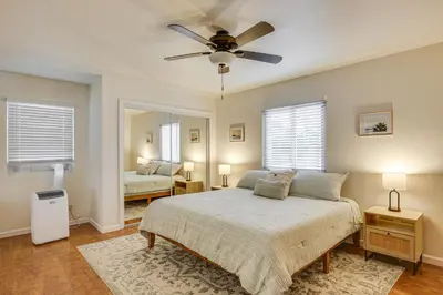 a bedroom with a bed and a ceiling fan at 2 Mi to Ocean Pet-Friendly Imperial Beach Retreat in Imperial Beach