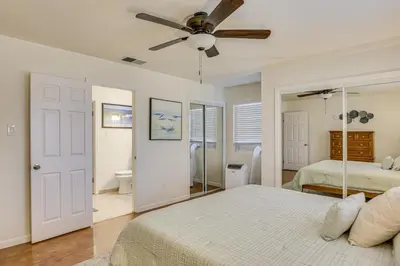 a bedroom with two beds and a ceiling fan at 2 Mi to Ocean Pet-Friendly Imperial Beach Retreat in Imperial Beach