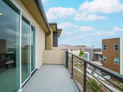 a balcony with a view of a building at Beautiful Irvine Grand Park Community Cozy and Comfortable Home in Irvine