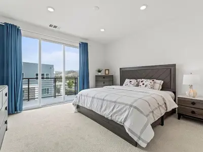 a bedroom with a bed and a large window at Beautiful Irvine Grand Park Community Cozy and Comfortable Home in Irvine