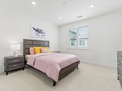 a bedroom with a large bed and a window at Beautiful Irvine Grand Park Community Cozy and Comfortable Home in Irvine