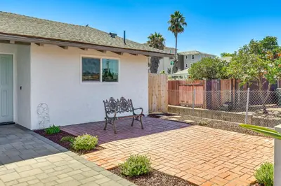 a patio with a bench in front of a house at Day Trip to San Diego San Marcos Home Near Hiking in San Marcos
