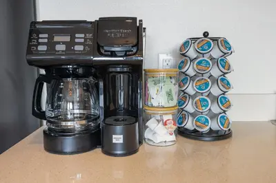 a coffee maker sitting on top of a counter at LUX Oasis North Park, King Beds, Workspaces, Parking in San Diego