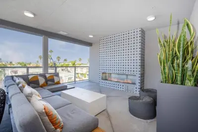 a living room with a couch and a fireplace at LUX Oasis North Park, King Beds, Workspaces, Parking in San Diego