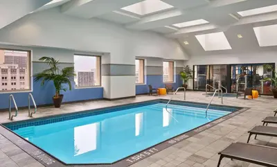 a pool in a hotel room with blue water at Marriott Vacation Club San Diego Studio Apartment with Resort Access in San Diego