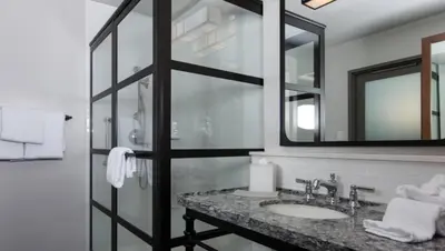 a bathroom with a sink and a mirror at Marriott Vacation Club San Diego Studio Apartment with Resort Access in San Diego