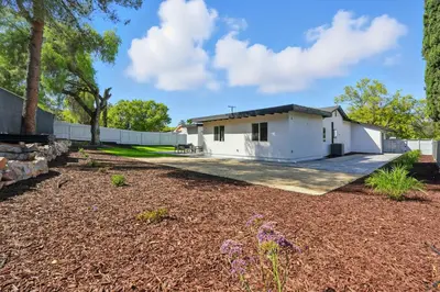 a white house with a fence and a yard at Xlnc Exotic Home Witt Rd Poway in Poway