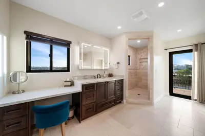 a bathroom with a sink and a shower at Luxury Point Loma Retreat Pool Spa Views in San Diego