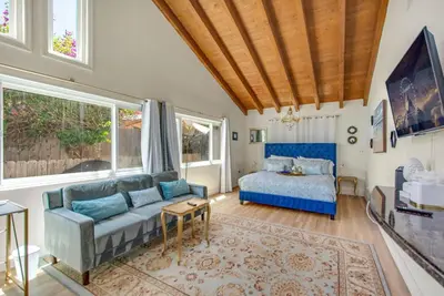a living room with a couch and a bed at Relax Explore from Mission Viejo Pool Spa in Mission Viejo