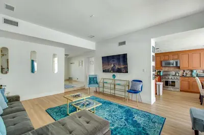 a living room with a couch and a table at Relax Explore from Mission Viejo Pool Spa in Mission Viejo