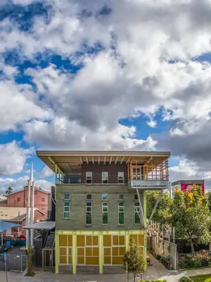 a building with a balcony on top of it at Hotel Narcissus - Room 6 in San Diego