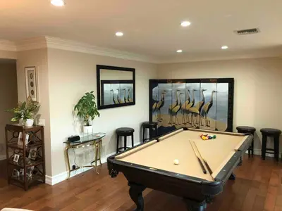 a billiard room with a pool table and stools at San Diego Paradise - Scenic Views, Pool and Spa in El Cajon