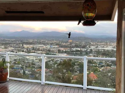 a view of a city from the balcony of a house at San Diego Paradise - Scenic Views, Pool and Spa in El Cajon