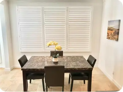 a dining room with a table and chairs and a window at Corporate Housing, Vacation Rental in Irvine in Irvine