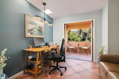 an office with a desk with a computer on it at La Jolla Gem Ocean Views Walk to Village Beach in San Diego