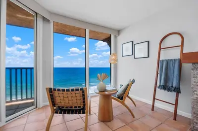 a living room with a view of the ocean at Top of the Wave - DMST31 in Solana Beach