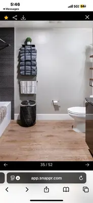 a picture of a bathroom with a toilet at Janna hospitality in San Diego
