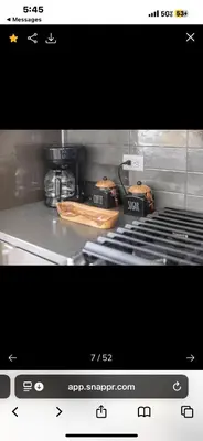 a kitchen with a stove with some food on it at Janna hospitality in San Diego