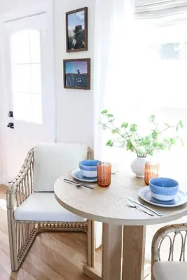 a dining room with a table and a chair at Work-From-Beach Dream Ocean Views Hot tub, BBQ in Oceanside