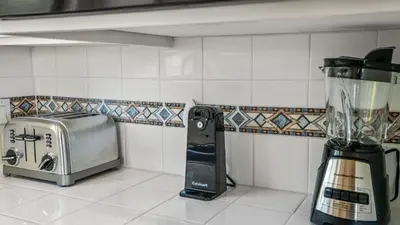 a kitchen counter with a blender and a toaster at Scenic Deck w Sunset Views Near Temecula Wineries Estrada Ranch by AvantStay in Fallbrook