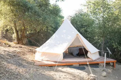 a tent in the middle of a field at Cozy Bell Tent in Palomar Mountains in Pauma Valley
