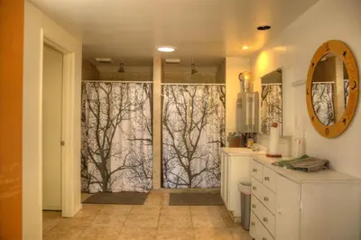 a bathroom with a shower with a window with trees at Group Bunkhouse Sleeps 12 Mountain Views in Palomar Mountain