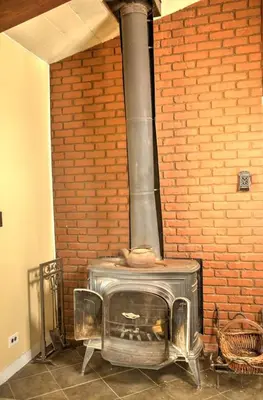 a brick oven in a room with a brick wall at Harrison Serenity Ranch - Groups over 50 in Palomar Mountain