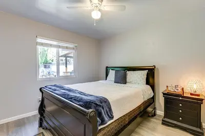 a bedroom with a bed and a ceiling fan at Pet-Friendly Apt 11 Mi to Dtwn San Diego! in Spring Valley