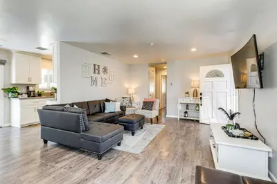 a living room with a couch and a table at Pet-Friendly Apt 11 Mi to Dtwn San Diego! in Spring Valley